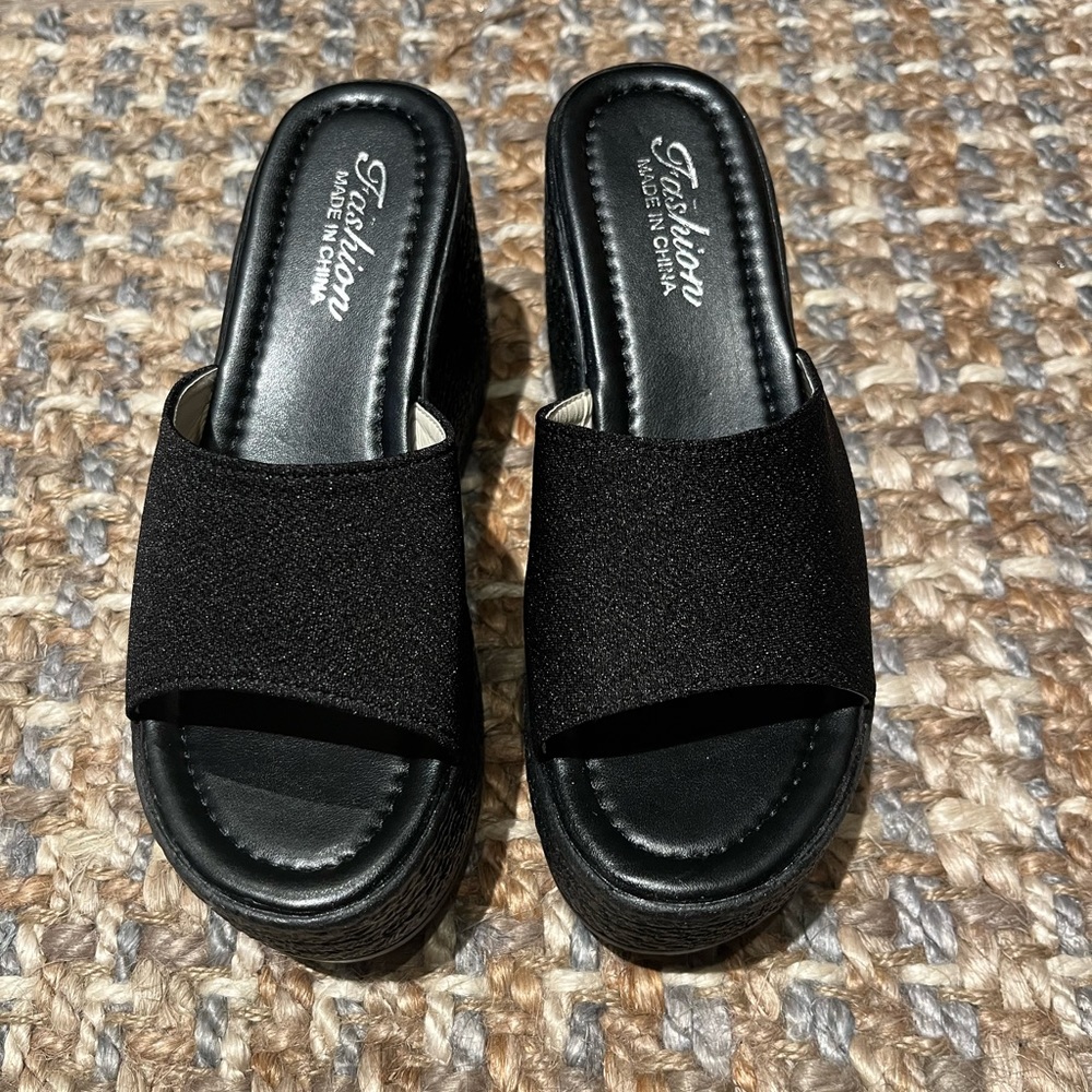 Black wedges. Never worn